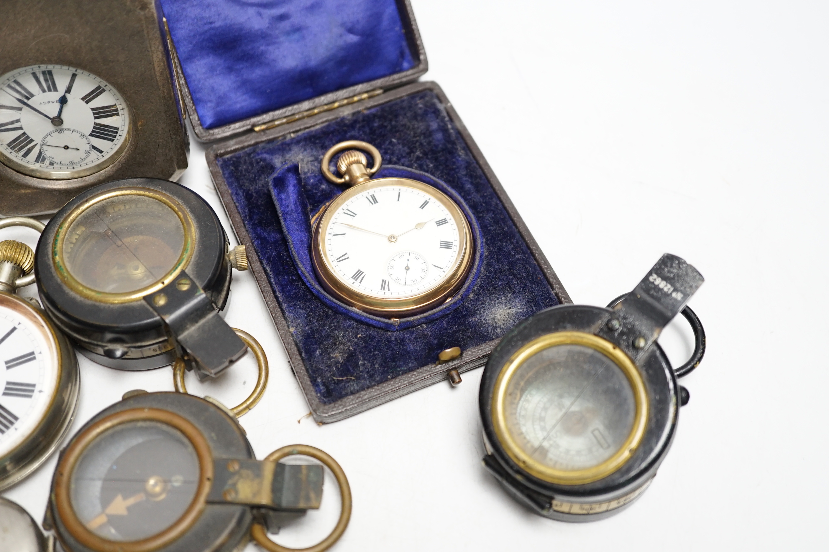 An Asprey pocket watch in silver mounted case, brass cased carriage timepiece, military compasses etc.